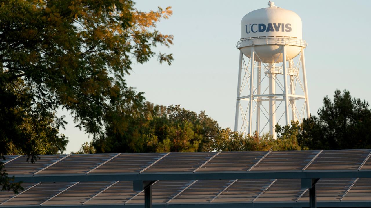 The UC Davis Water Tower with the parking lot solar panels.