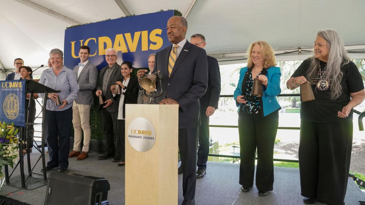 Chancellor May Rings the Bell at the Grand Opening Ceremony