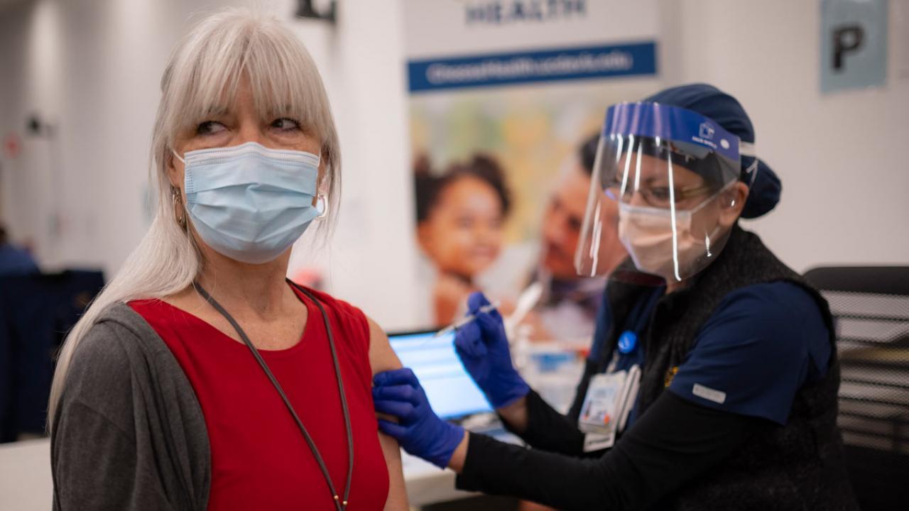 woman receiving a vaccination