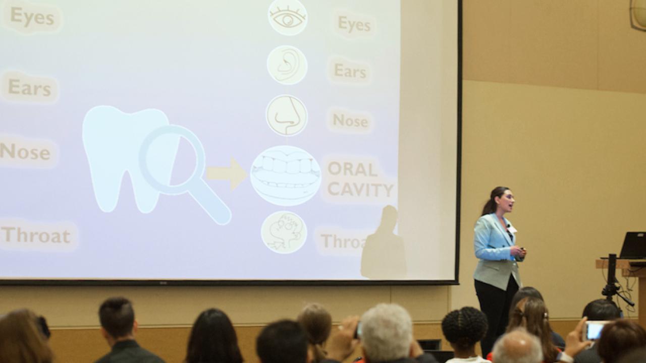 UC Davis Grad Slam champion Tooka Zokaie presenting at the 2018 UC Davis Grad Slam Final Round