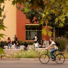 Students talks outside the Student Community Center on the first day of class.