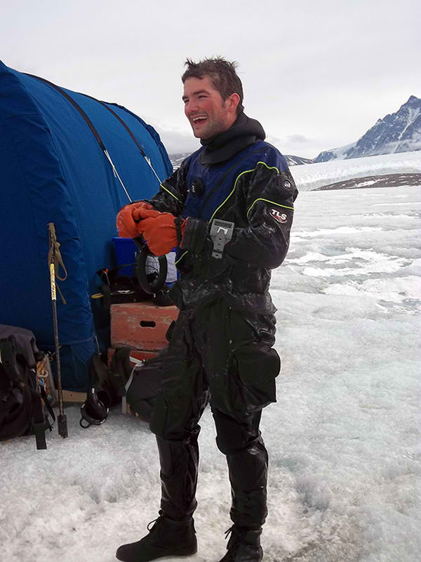 Tyler in his wet suit after a dive